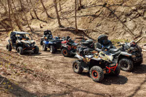 quad atv cars all terrain vehicle parked mountain road