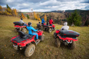 Czy na quada musze miec prawo jazdy? 1 rear view group five person riding quad bikes hill enjoying beautiful autumn scenery